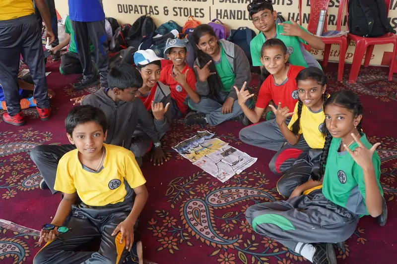 Mysuru ADDA field moment 6 — students mid-activity during an outdoor program