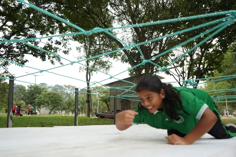 Mysuru ADDA field moment 10 — students mid-activity during an outdoor program