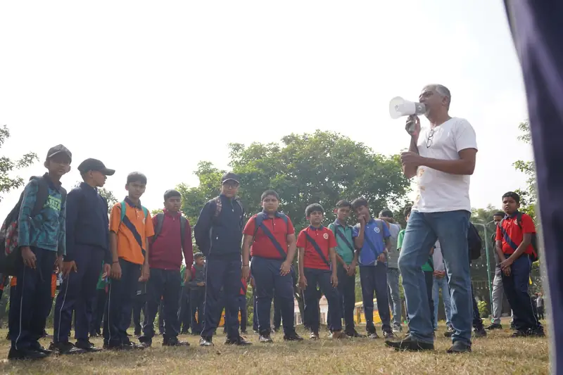 Mysuru ADDA field moment 13 — students mid-activity during an outdoor program